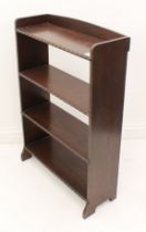 A small 1930s to 1940s oak open bookcase - the four shelves with bead turned edge, the top shelf