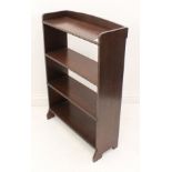 A small 1930s to 1940s oak open bookcase - the four shelves with bead turned edge, the top shelf