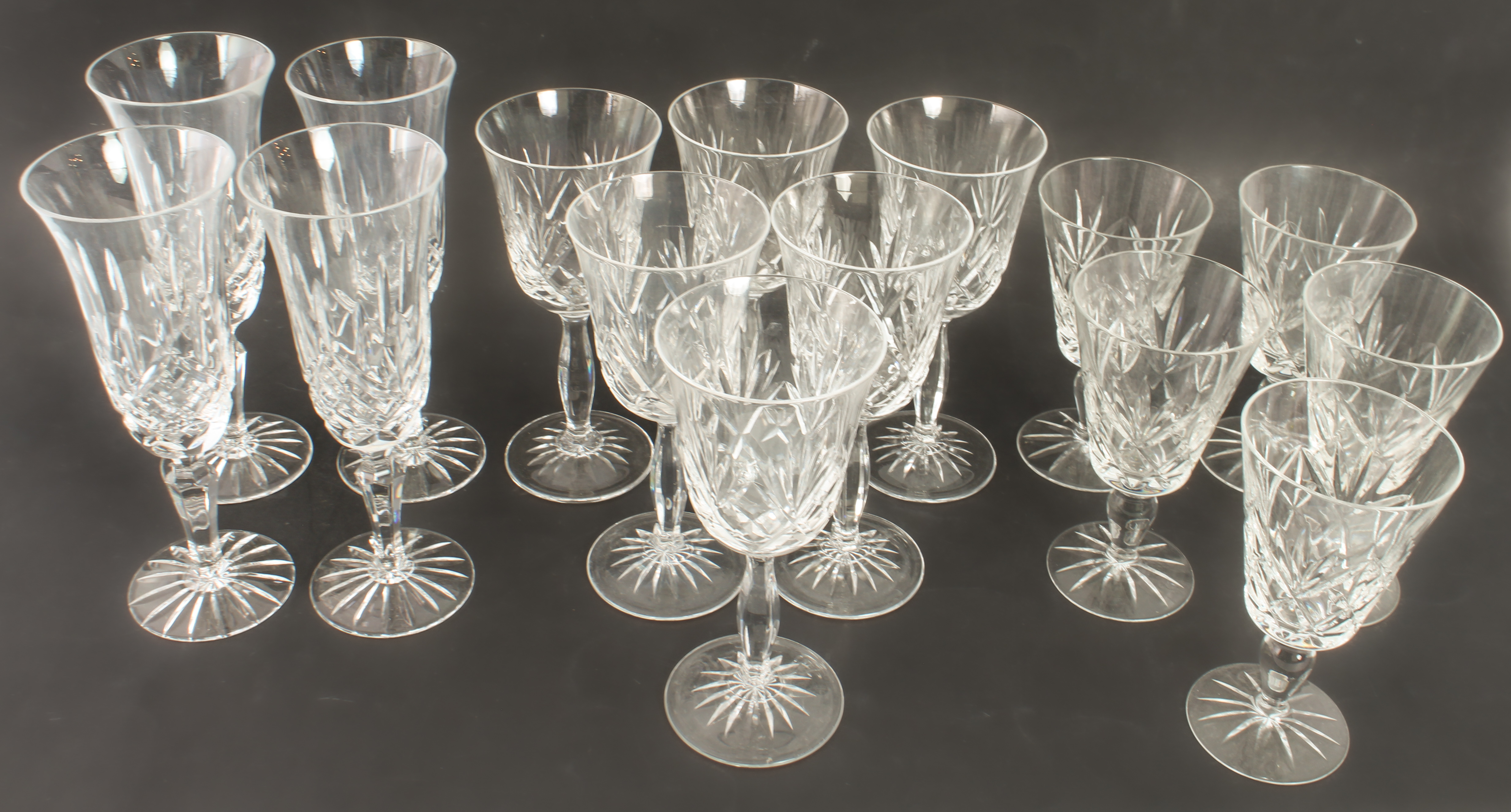 A part-set of cut-glass wine glasses with sunburst bases: 6 x 16.5 cm wines  6 x 13.5 cm wines 4 x - Image 2 of 4