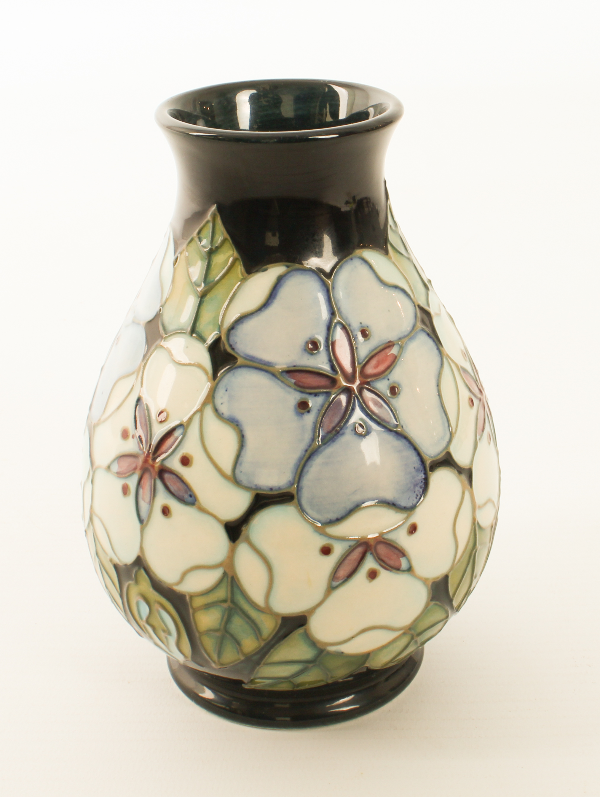 A Sally Tuffin for Moorcroft baluster vase - in the Tudor Rose design, impressed factory marks,