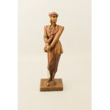 A bronzed plaster figure of a female golfer - by Austin Sculpture, impressed marks, 41.5 cm high.