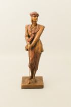 A bronzed plaster figure of a female golfer - by Austin Sculpture, impressed marks, 41.5 cm high.