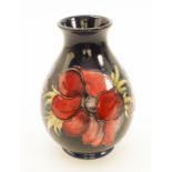 A Moorcroft baluster vase in the 'Anemone' pattern - painted WM initials and painter's mark and