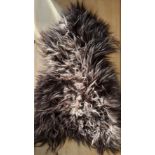 An Icelandic sheepskin rug by Hanlin - in very good condition.