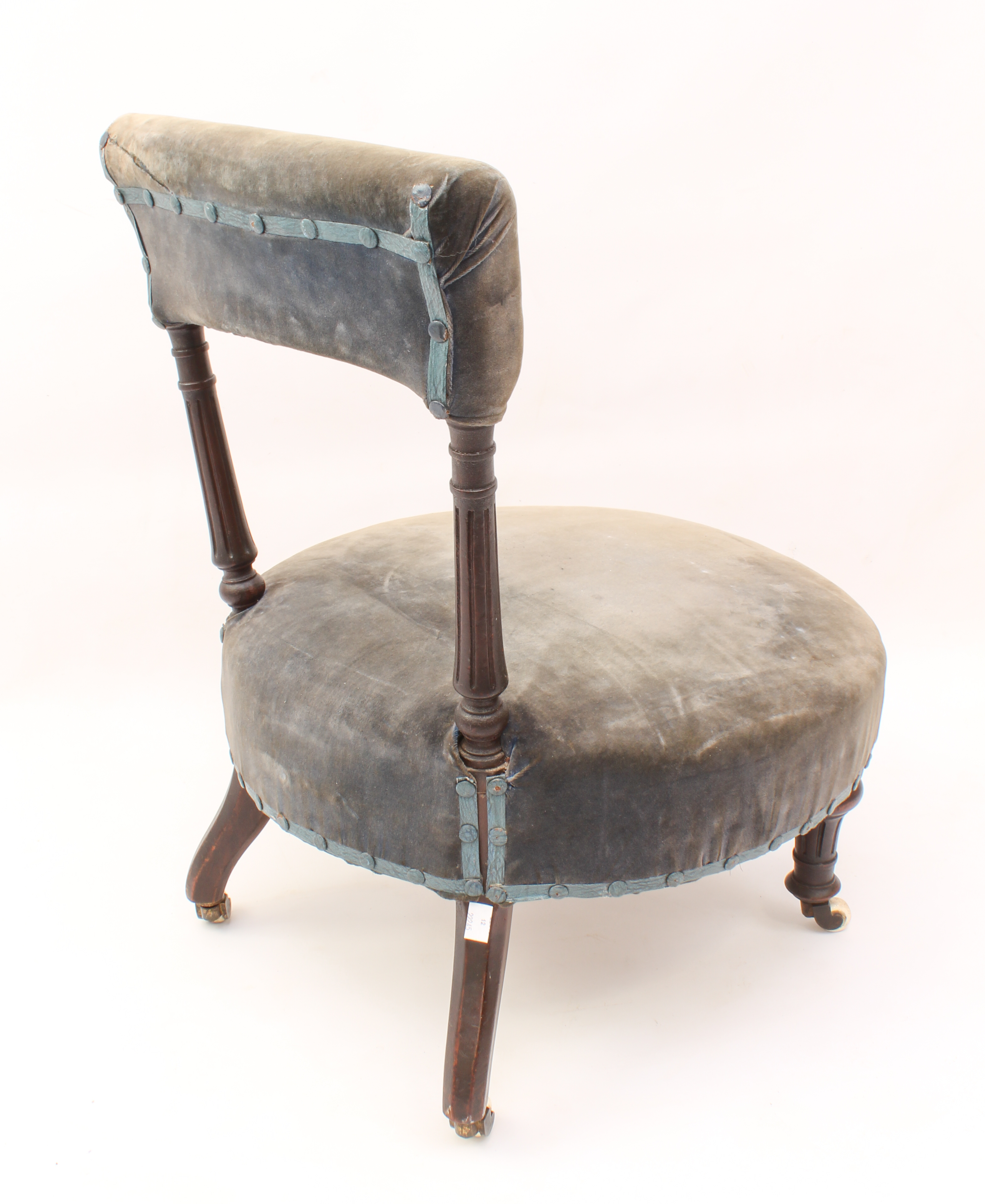 A Victorian walnut nursing chair - the padded top back on fluted turned uprights, over a circular - Image 2 of 2