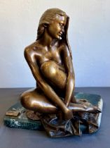 A modern bronze of a seated female nude - by Manuel Vidal Torrens, for Ebano Int., light golden