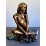 A modern bronze of a seated female nude - by Manuel Vidal Torrens, for Ebano Int., light golden