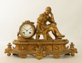 A French gilt-spelter mantel clock - early 20th century, the case with a seated figure of William