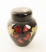 A small Walter Moorcroft ginger jar in the 'Hibiscus' pattern - 1950s-60s, 'late Queen Mary' paper