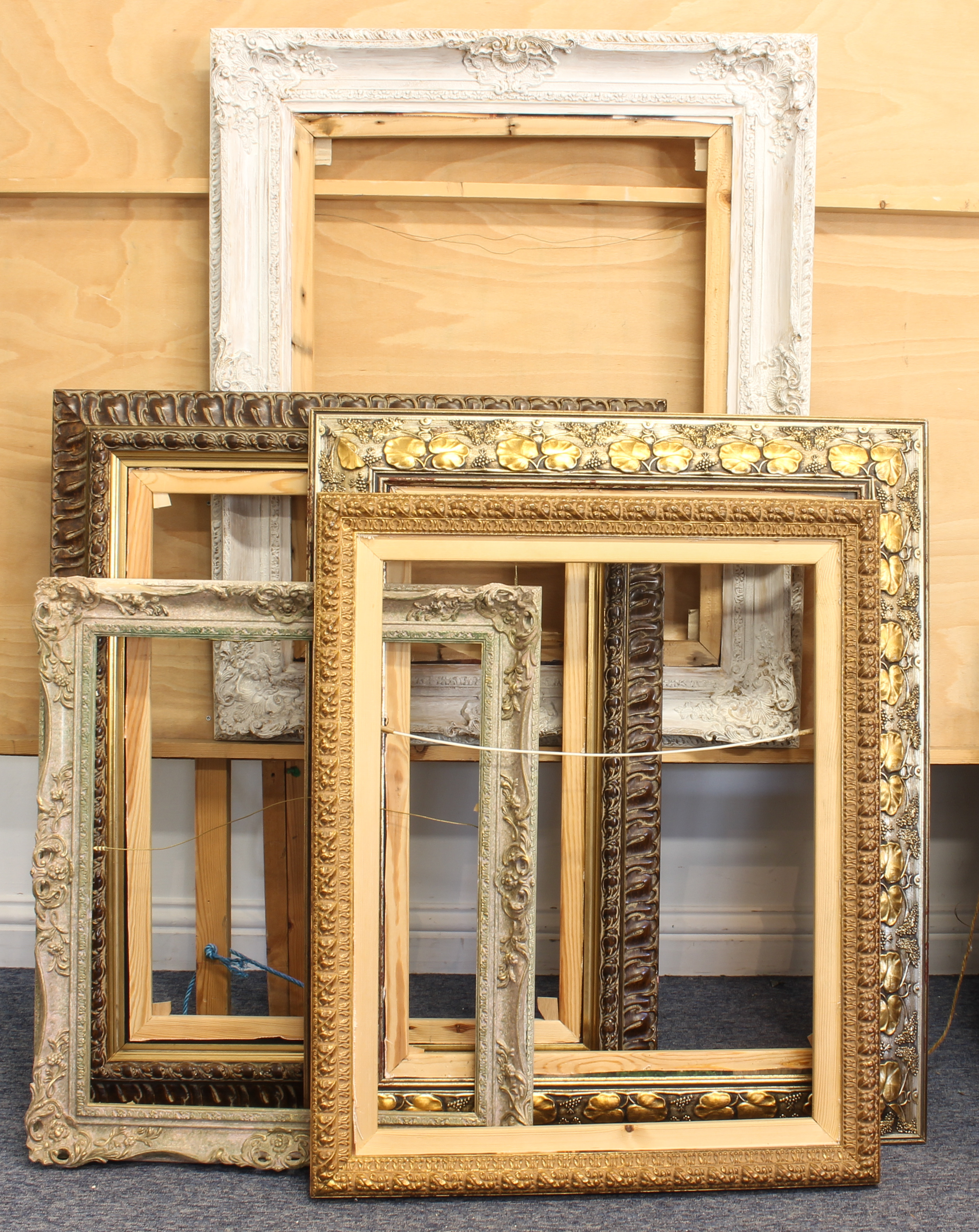 Five large modern antique-style wooden picture frames - gilt and painted finishes, various sizes.