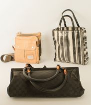 Three vintage handbags: 1. a Gucci black monogram fabric shoulder bag, with black leather base,