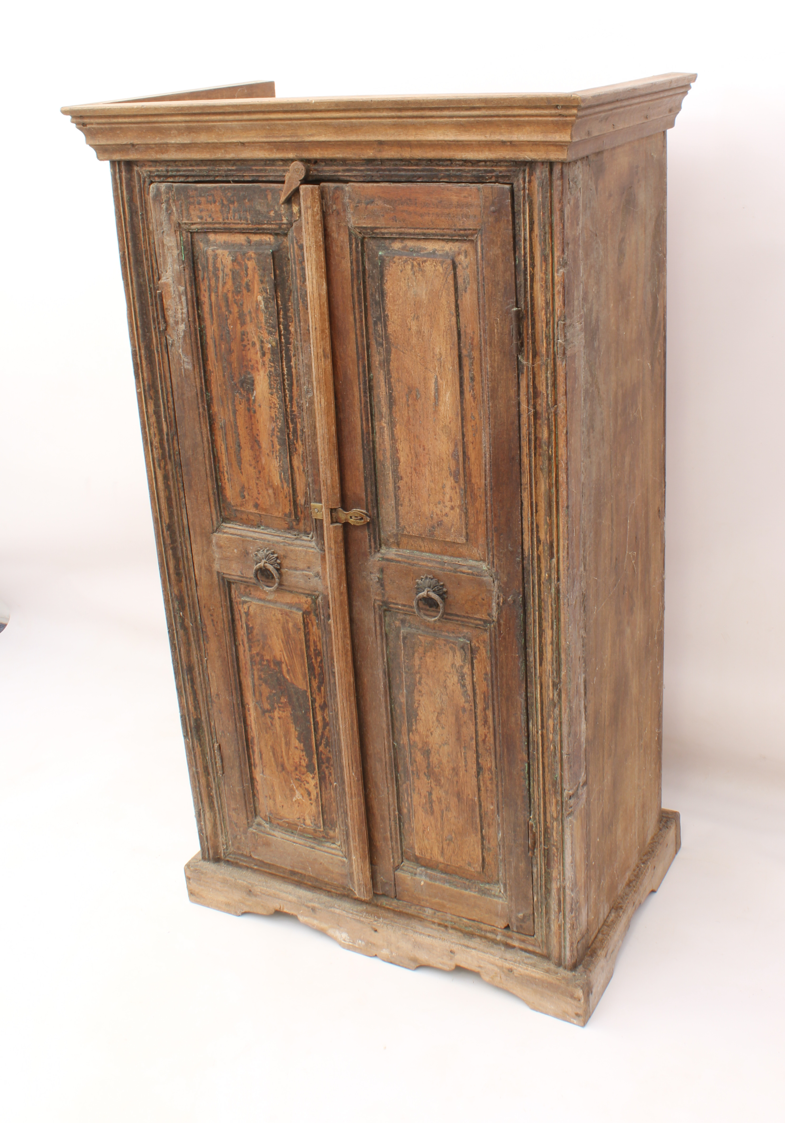 An Indian panelled hardwood cupboard - early 20th century, the later flared, moulded cornice over - Image 3 of 3