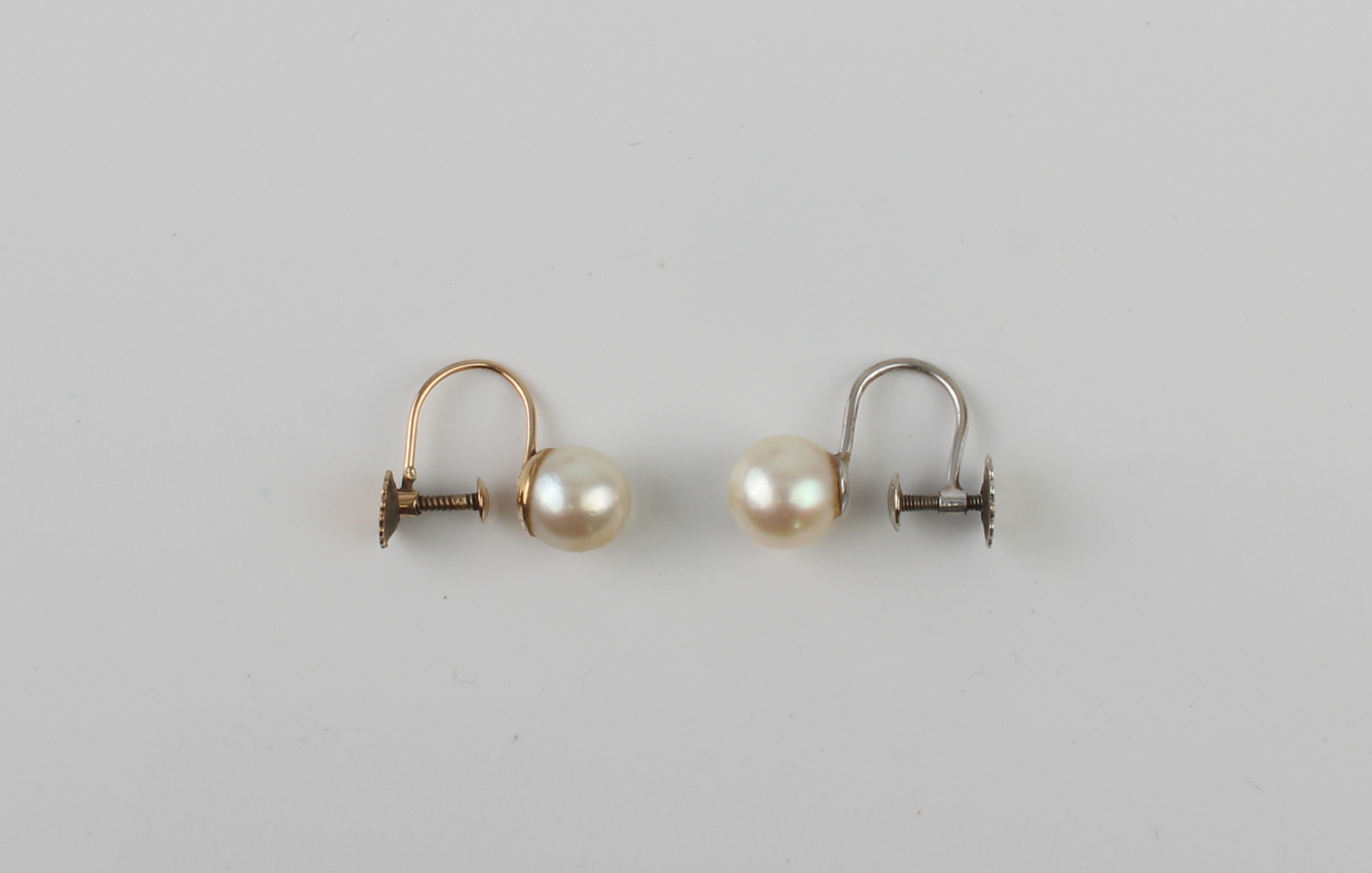 Two cultured pearl and 9ct gold earrings - both with 7mm pearls, one in white gold, the other yellow - Image 2 of 3