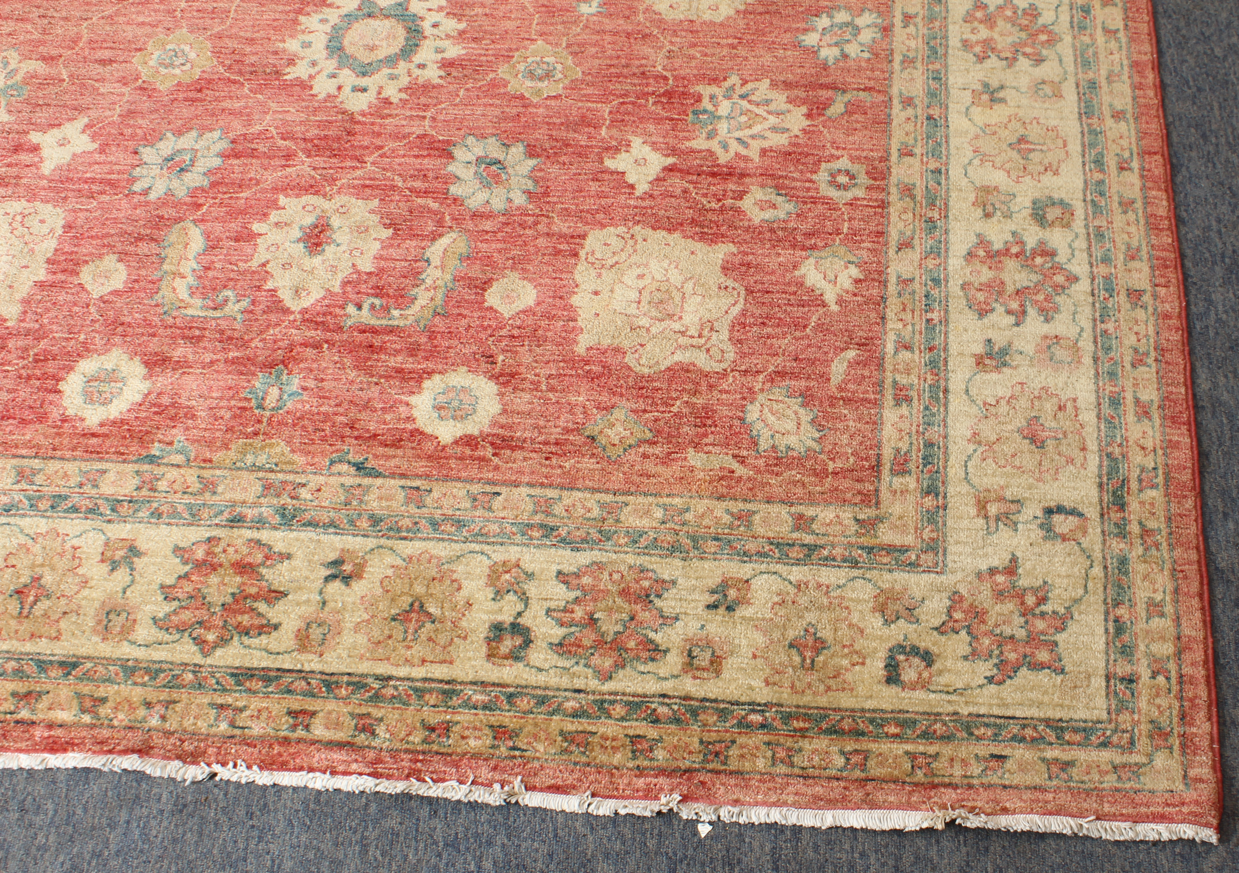 A hand knotted wool Afghan Ziegler rug - with typical all over floral decoration on a madder ground, - Image 3 of 5