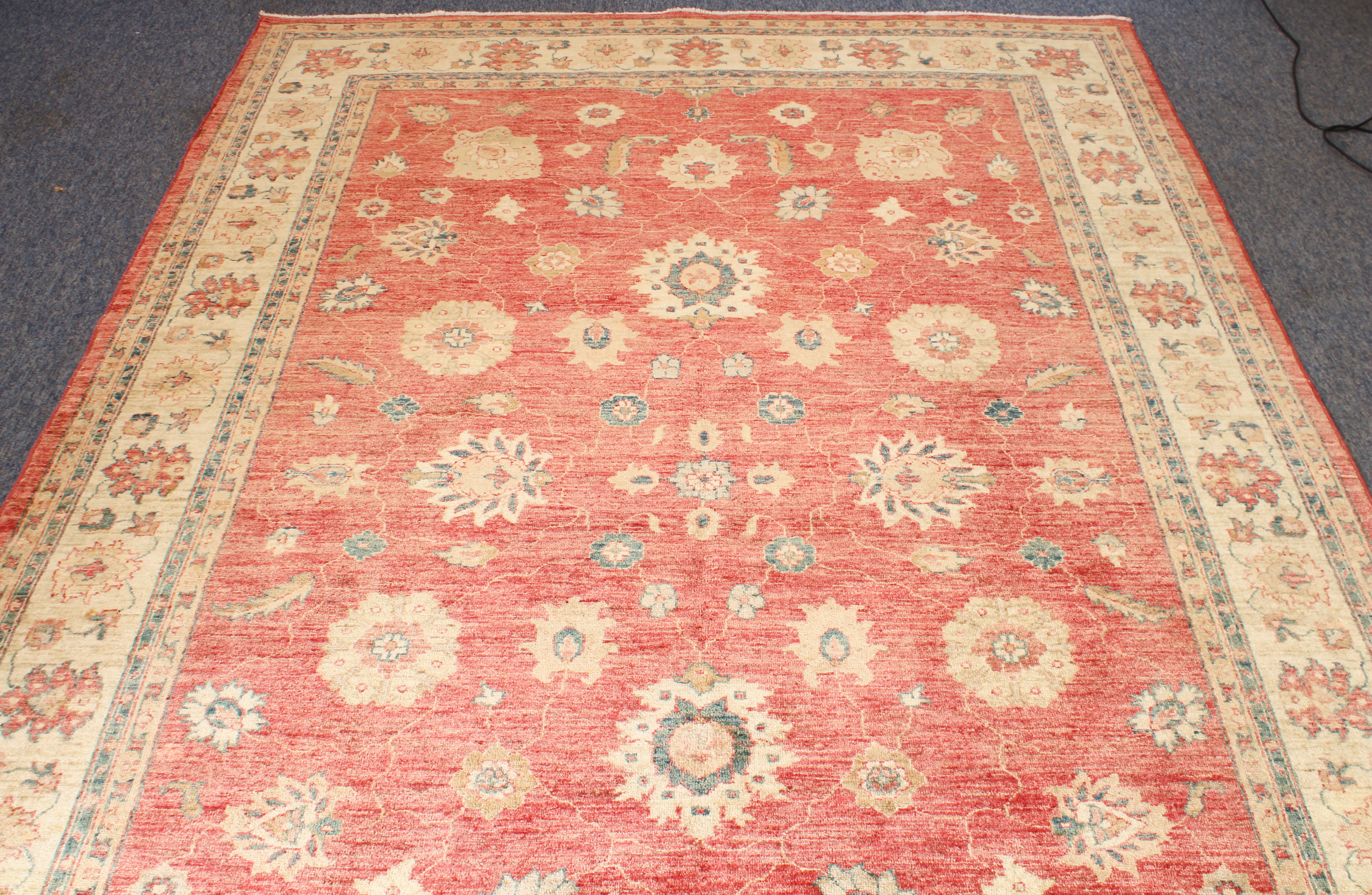 A hand knotted wool Afghan Ziegler rug - with typical all over floral decoration on a madder ground, - Image 2 of 5