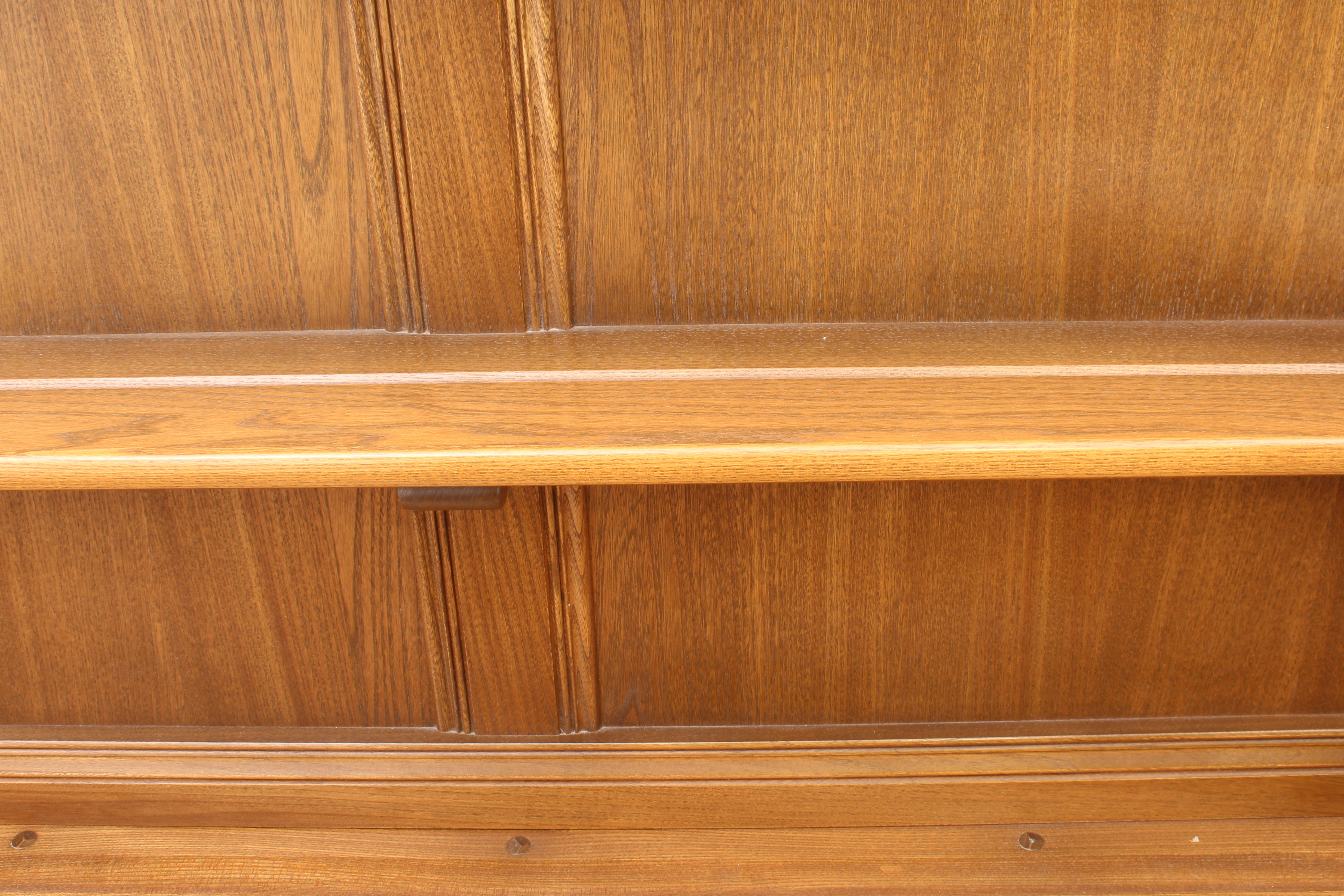 An Ercol Windsor elm dresser - the back with waterfall plate rack, over a base with two drawers (one - Image 8 of 8