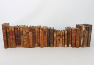 Thirty-six 18th and 19th century books with leather, gilt tooling and marbleised bindings: Daniel