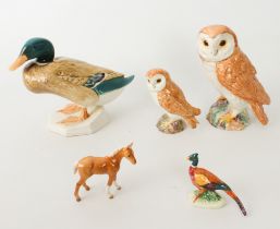 Five Beswick figures: a 1046 and a 2026 (smaller) Barn Owl;  an 817 Mallard on octagonal base, 16.75