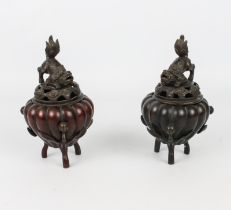 A pair of Chinese bronze tripod censers - probably early 20th century, of pumpkin or gourd form,