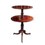 A late-Regency mahogany two-tier dumb waiter - of good colour, the two graduated, revolving tiers