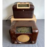 Two Bush bakelite radios - 1950s, comprising a DAC 90A and a DAC 10, both with brown bakelite cases,