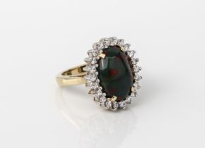 A 9ct yellow gold, bloodstone and white sapphire cluster ring - hallmarked Sheffield 2004, the large