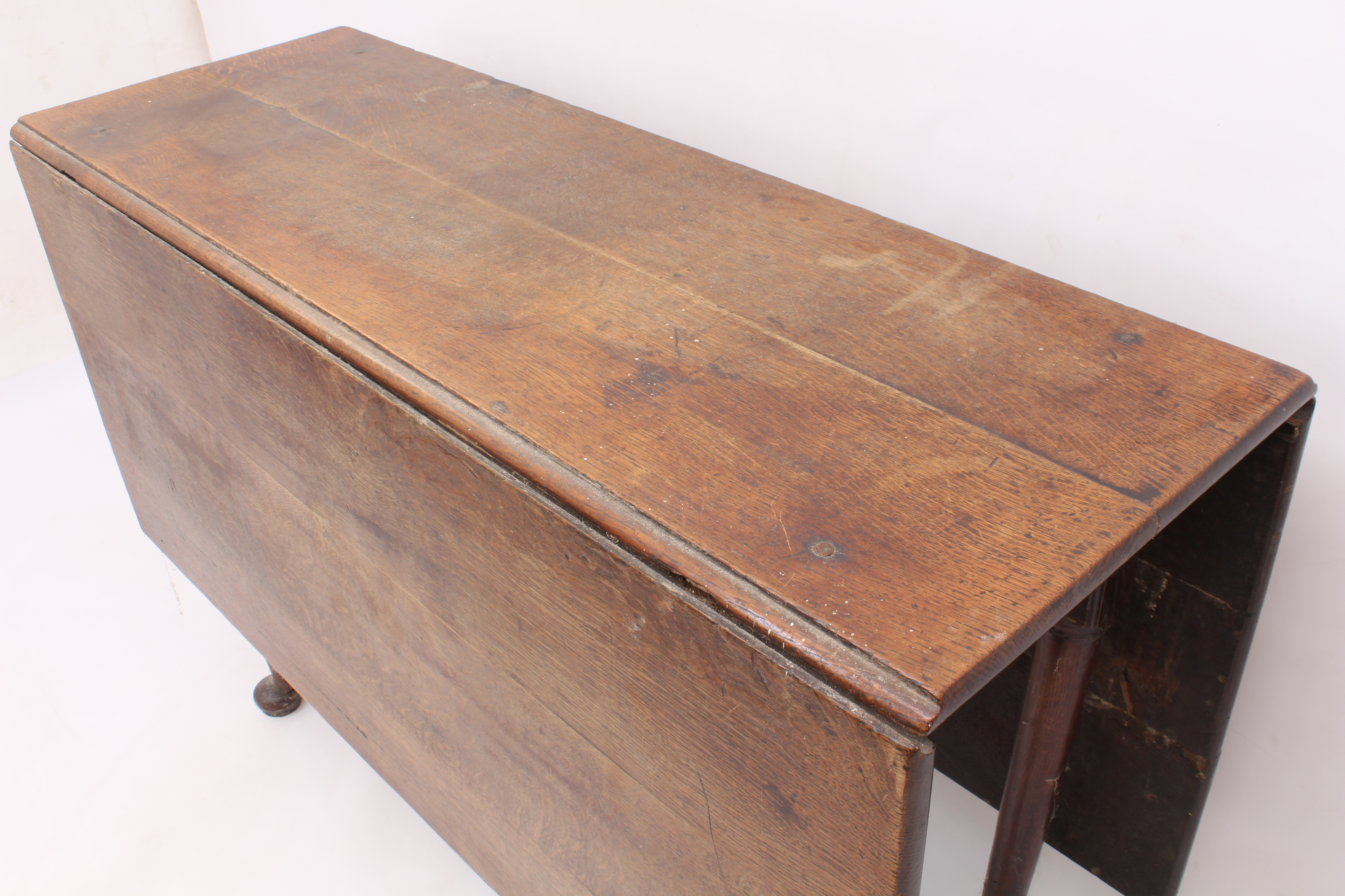 An 18th century joined oak dropleaf dining table - the rectangular dropflap top opening on gatelegs, - Image 3 of 3