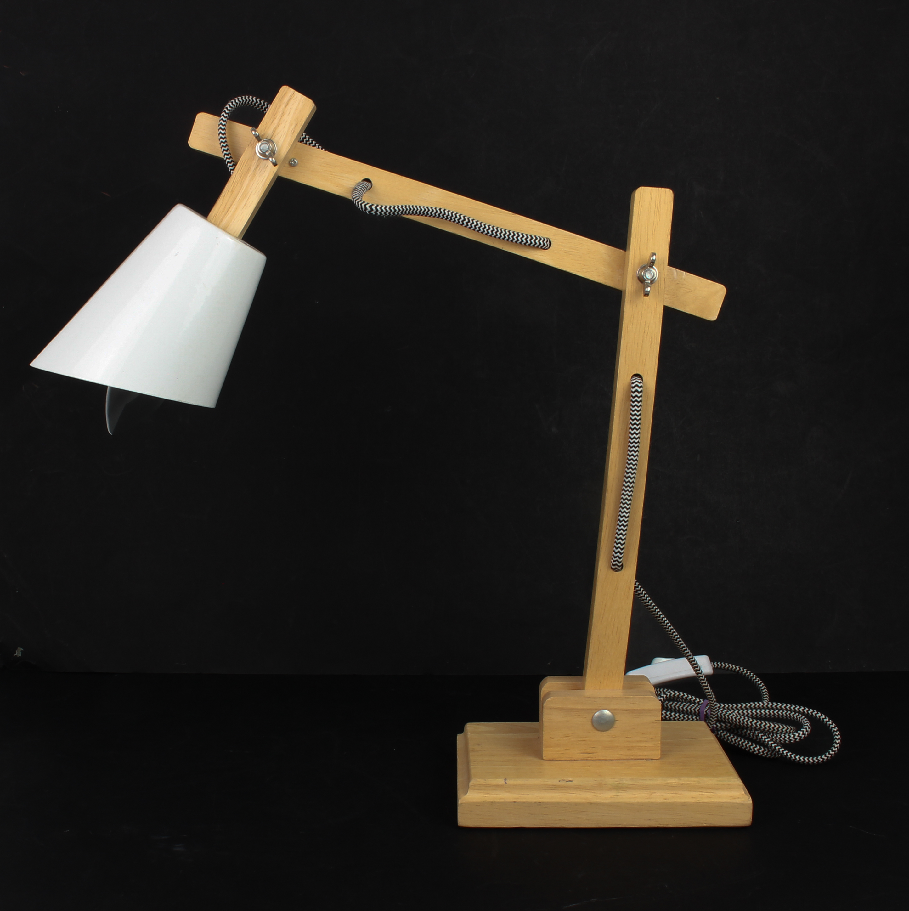 A modern anglepoise style desk lamp - in beechwood with white painted conical shade and adjustable