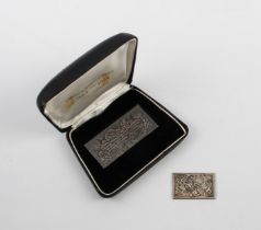 A sterling silver George VI stamp plaque - Royal Mint, London 2001, 21.3g; and a commemorative