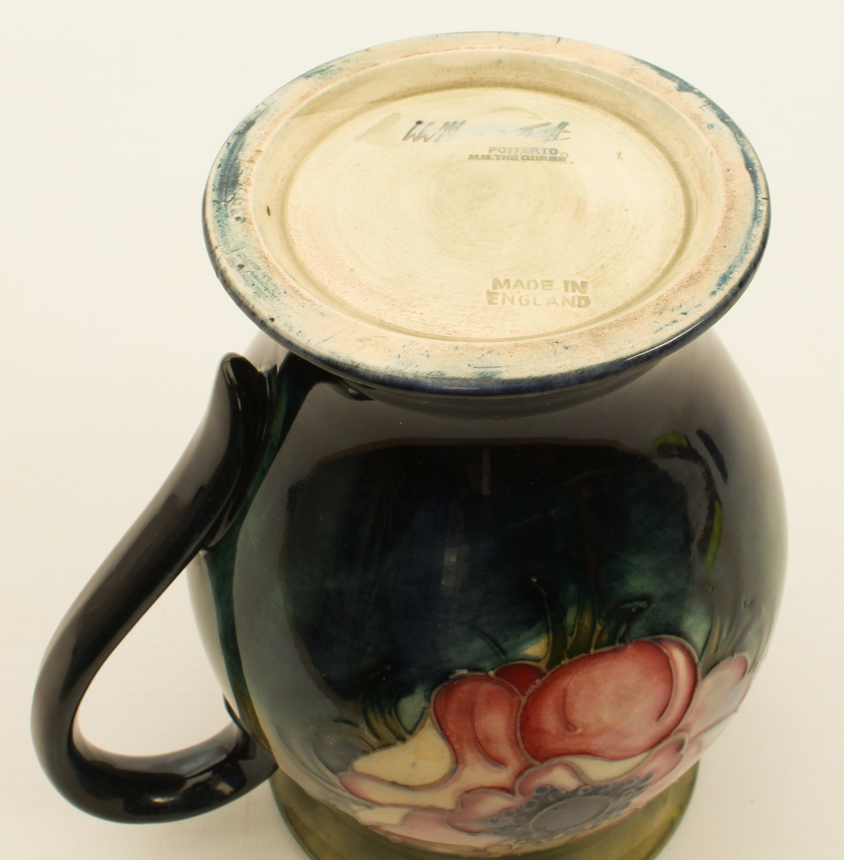 A Moorcroft jug in the 'Anemone' pattern - impressed factory mark with facsimile signature, also - Image 4 of 4