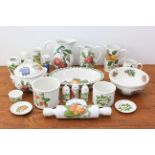 A collection of Portmeirion Pomona and other fruit pattern dinner and oven to table ware - including