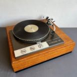 A Garrard Model 401 Transcription Motor turntable record player - in a teak veneered plywood