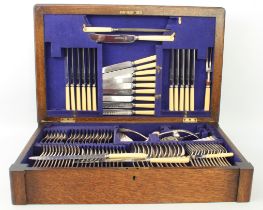 An oak canteen of silver plated Old English pattern flatware - 1930s-40s, twelve place settings,