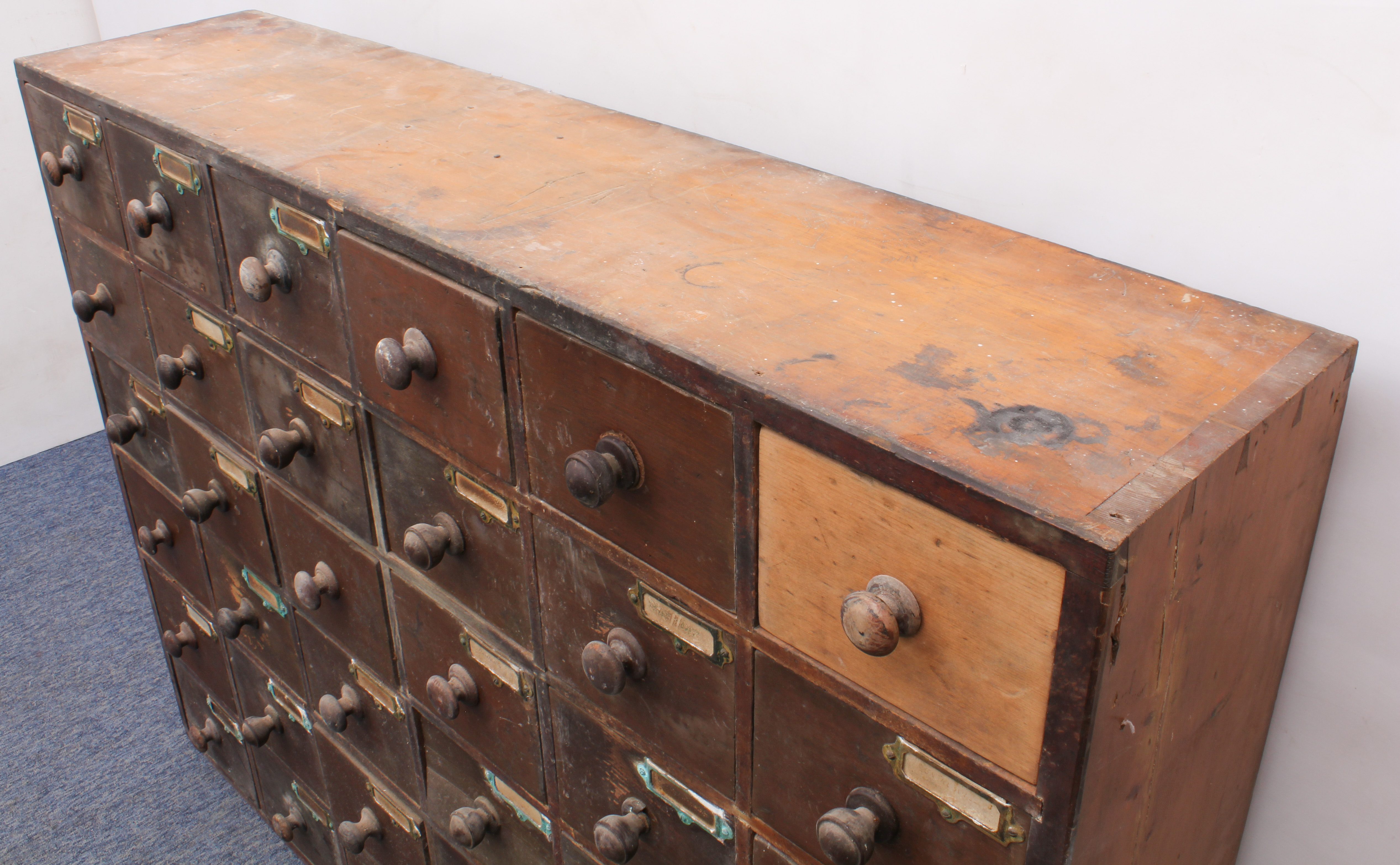 An early 20th century pine and beech wood 30-drawer pharmacy or shopkeeper's cabinet - the - Image 2 of 3