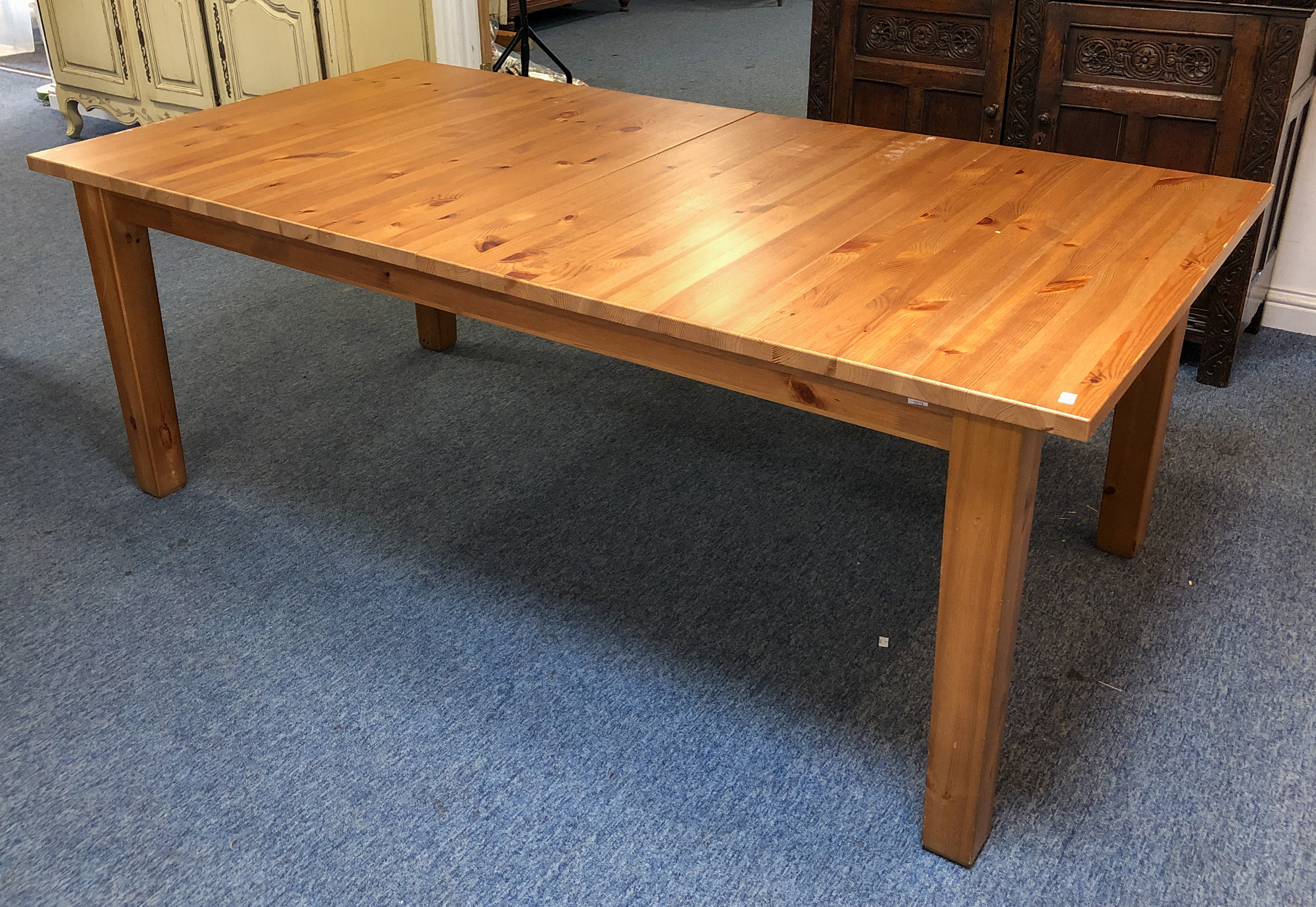 A large modern pine rectangular extending dining table - with pull-out mechanism and two - Image 2 of 2