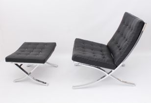 A modernist Barcelona chair and foot stool in black leather and chrome - after an original design by