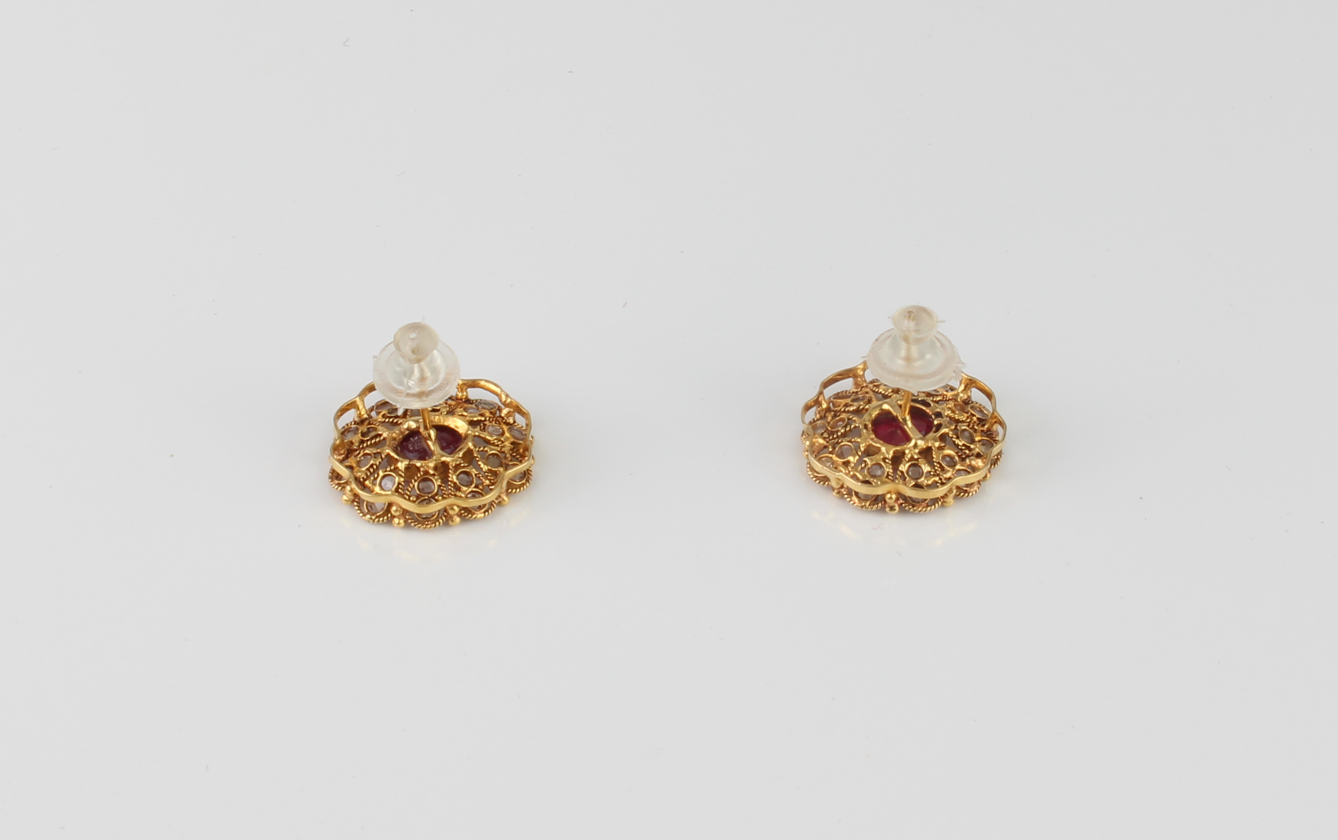 A 22ct gold, red stone and diamond cluster pendant necklace and earrings en suite - unmarked, - Image 3 of 5