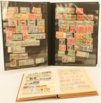 Two stock books of Commonwealth stamps: 1. large black stock book - George V to early Elizabeth II