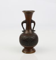 An early Oriental bronze vase.