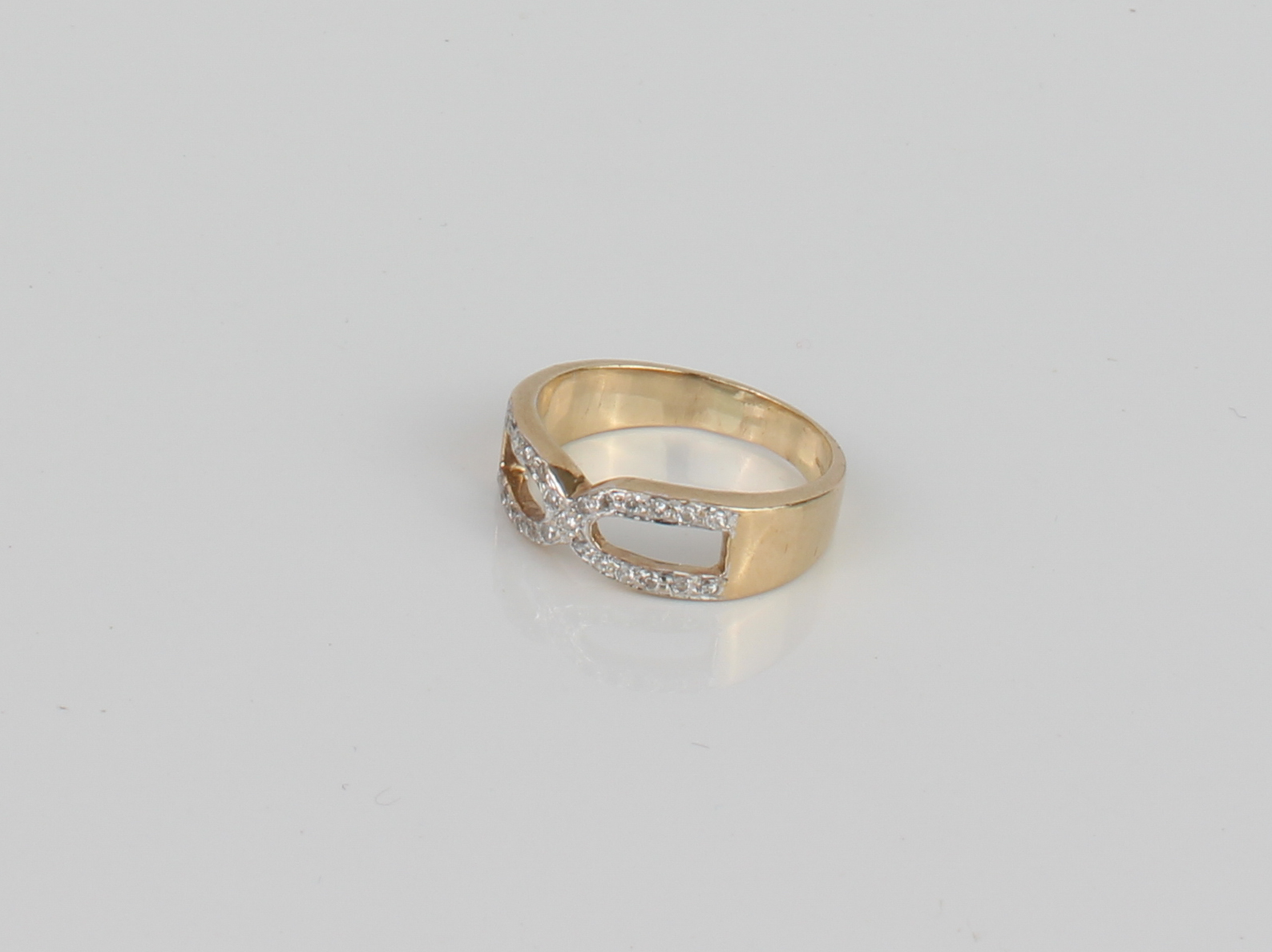 A 9ct gold and diamond 'double D' ring - London hallmarks, size Q, 4.4g.