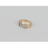 A 9ct gold and diamond 'double D' ring - London hallmarks, size Q, 4.4g.