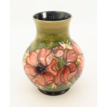 A large Moorcroft baluster vase in the 'Anemone' pattern - painted WM initials and impressed factory