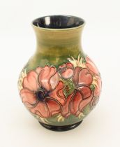 A large Moorcroft baluster vase in the 'Anemone' pattern - painted WM initials and impressed factory