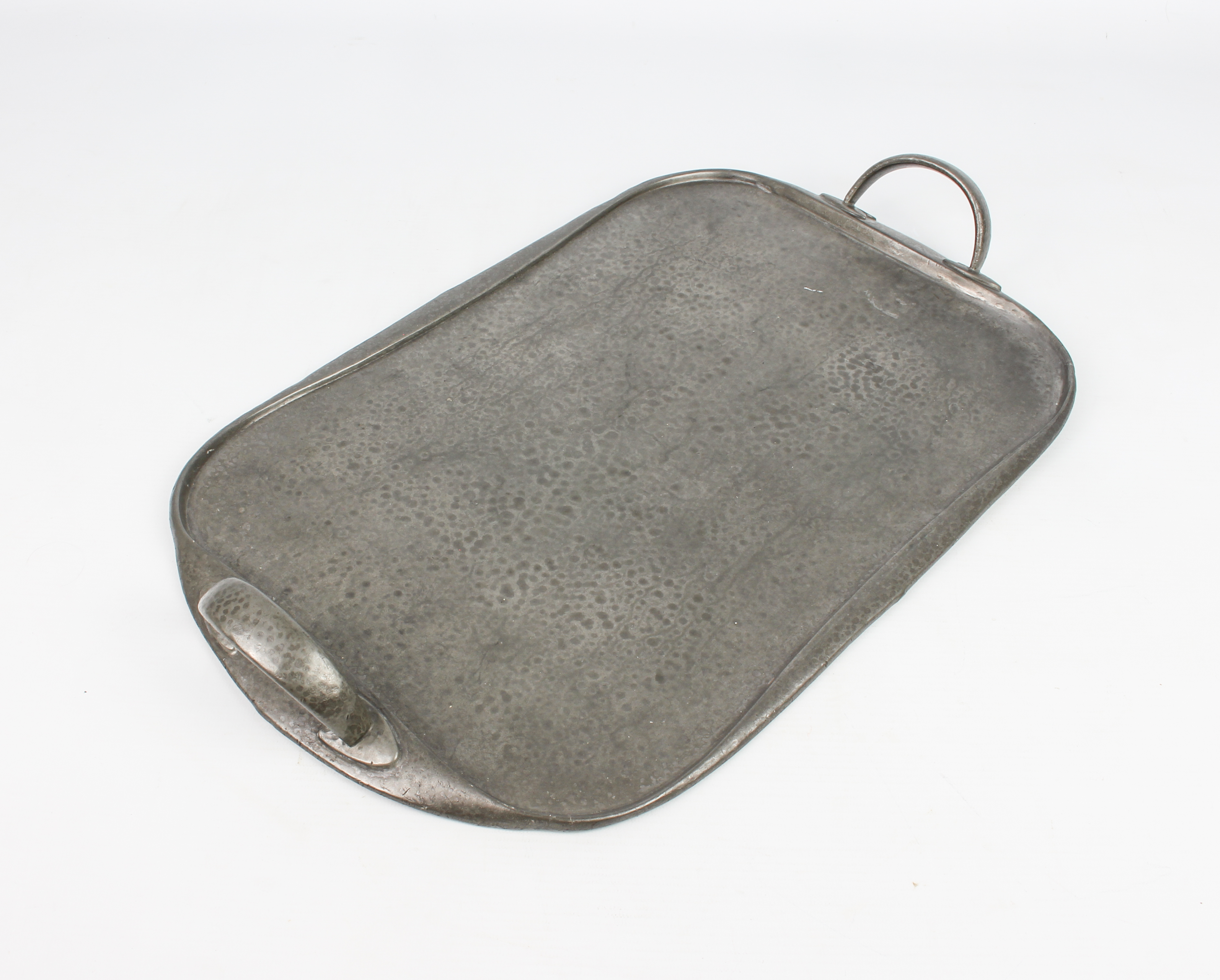 An Archibald Knox for Liberty & Co. 'Tudric' pewter tray - of rounded oblong form with planished