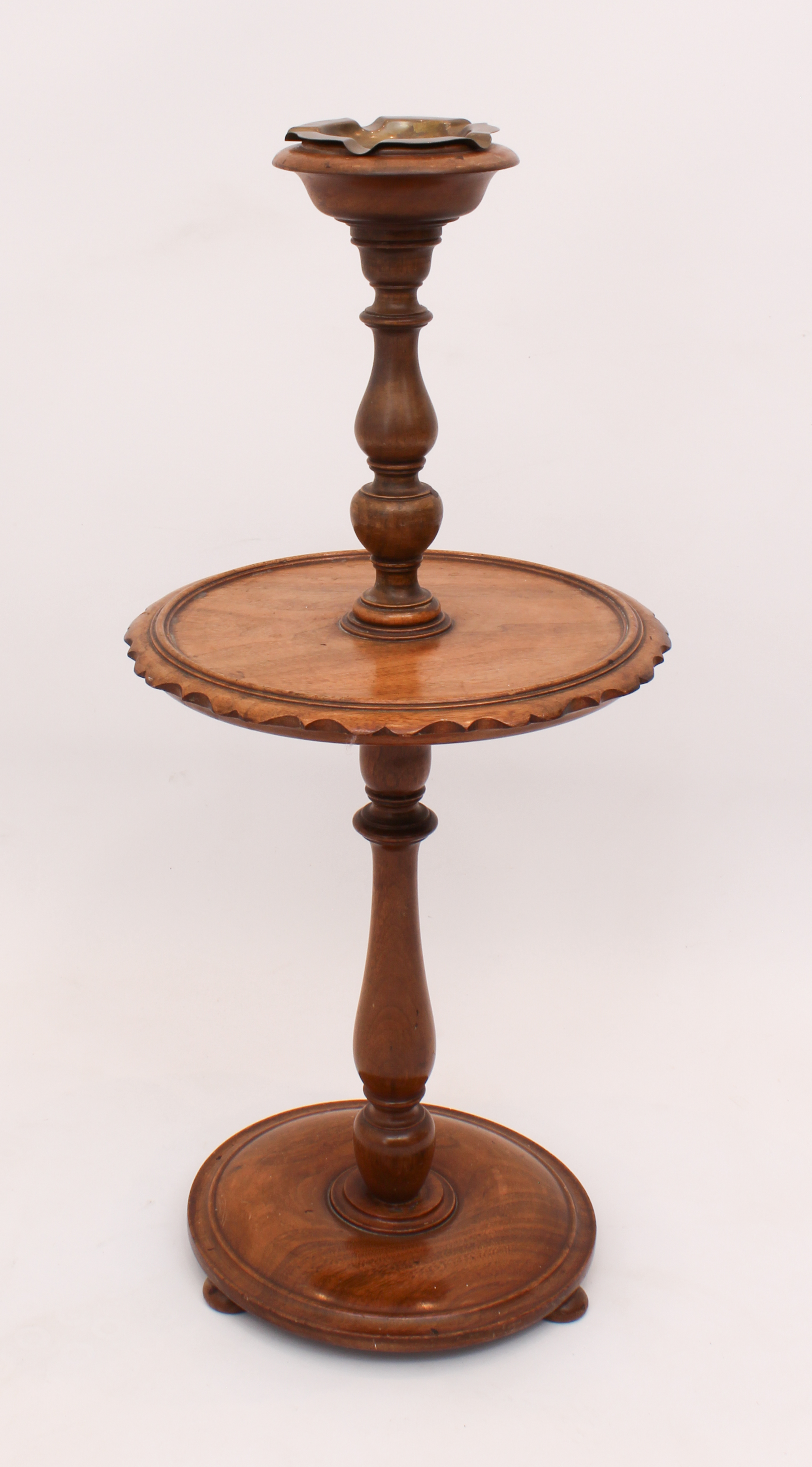 A mahogany smoker's companion - 1930s, two-tier with an ashtray top over a dished centre tier, on