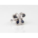 A vintage 18ct white gold, sapphire and diamond butterfly ring - hallmarked London 1979, the