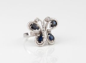 A vintage 18ct white gold, sapphire and diamond butterfly ring - hallmarked London 1979, the