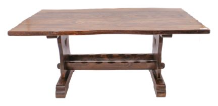An elm refectory-style dining table - second half 20th century, the top with naturally shaped edge