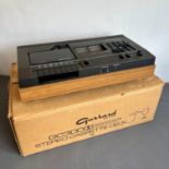 A 1970s Garrard GC300 hi-fi stereo cassette desk - top loading, with Dobly NR, teak case, with