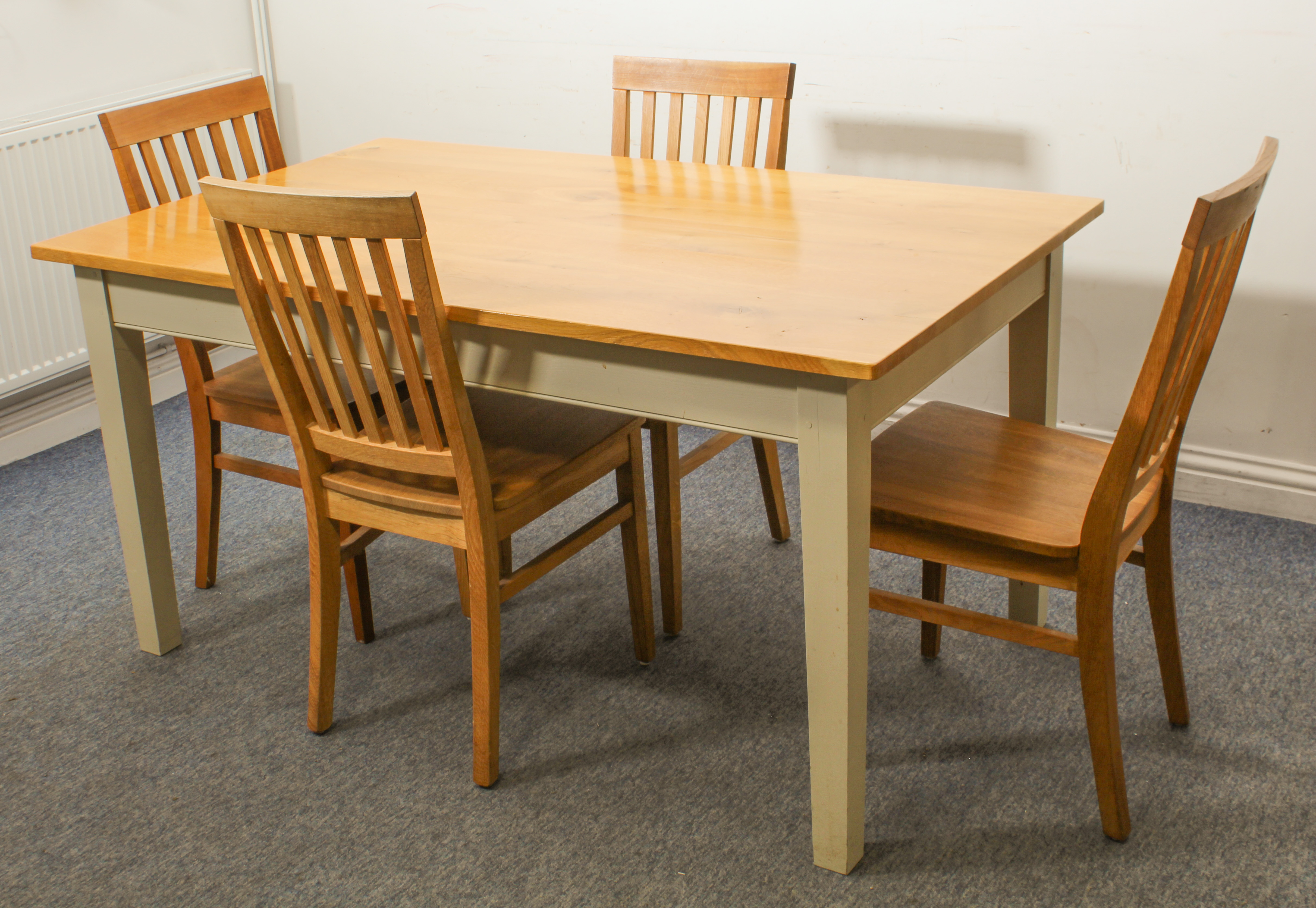 A painted and light-oak dining table - the rectangular light-oak top on a pale-grey painted frame